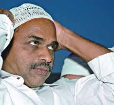Christian YSR wearing a Muslim topi. Y. S. Rajasekhara Reddy