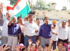 Kashmiri Hindus demanding power and water in the Jagati refugee camp.