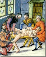 Castration in progress.