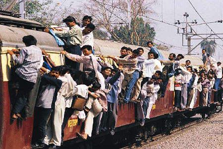 Mumbaikars going to college on a local train. Mumbai local train