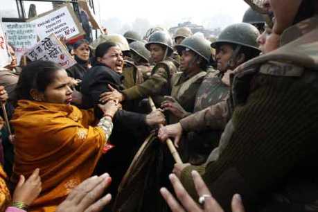 Women protesters face police in New Delhi