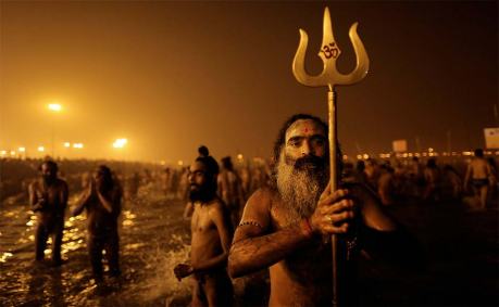 Naga sadhus bathing at the Kumbha Mela 2013