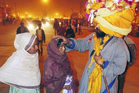 Nihang warrior blessing Kumbh pilgrims