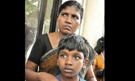 Dora and Jeen, wife and son of Jelestine, who was killed in the firing by Italian Marines Dora and Jeen, wife and son of Jelestine, who was killed in the firing by Italian Marines