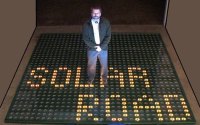 Scott Brusaw standing on a solar roadway panel.