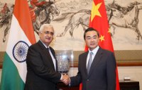  Khurshid and Wang Yi