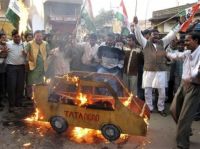 Tata driven out of Singur. Goes to Gujarat.