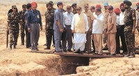 Vajpayee  with nuclear scientists at Pokhran test site.