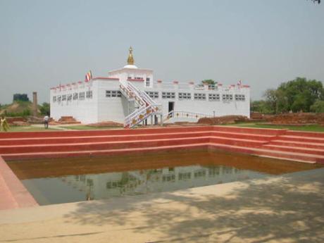 Maya Devi Temple with the Ashoka Pillar on the left.