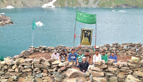 Kounsar Nag with a makeshift prayer ground made over the ancient Vishnu Pad Kounsar Nag