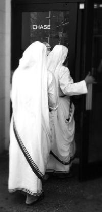 Missionary of Charity nuns entering the Chase Bank in New York.