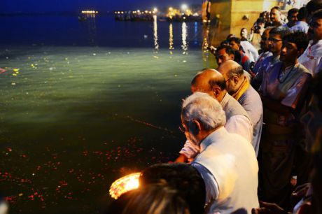 Indian prime minister Narendra Modi, bottom, and Bharatiya Janata Party (BJP) senior leaders perform the "Ganga Puja" religious ritual on the banks of the River Ganges a day after his electoral triumph in Varanasi on May 17, 2014. Modi promised the sacred river would be clean in five years. Photographer: Sanjay Kanojia/AFP/Getty Images Narendra Modi, Indian prime minister Narendra Modi, bottom, and Bharatiya Janata Party (BJP) senior leaders perform the