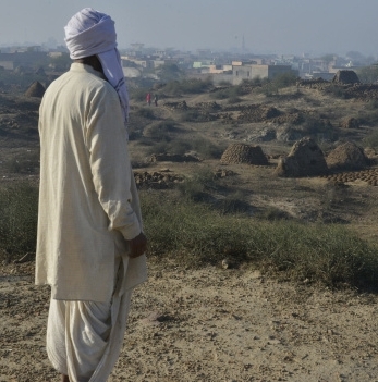 Rakhigarhi resident looks over ancient site
