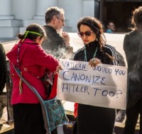 Protest against canonization of Junipero Serra at Mission Delores