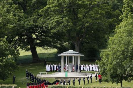 Soldiers stand next to the Magna Carta memorial during an event marking the 800th anniversary of the Magna Carta signing by King John at Runnymede, near London, England, June 15, 2015.