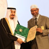 A handout picture released by the King Faisal Foundation on March 1, 2015 shows Saudi King Salman bin Abdul Aziz (L) presenting Zakir Naik, president of the Islamic Research Foundation in India, with the 2015 King Faisal International Prize for Service to Islam in Riyadh. Naik was honoured for being one of the most renowned non-Arabic speaking promoters of Islam. He founded the Peace TV channel, billed as the world's only channel specialising in comparative religion. AFP PHOTO / HO / King Faisal Foundation == RESTRICTED TO EDITORIAL USE - (MANDATORY CREDIT "AFP PHOTO / HO / King Faisal Foundation" )