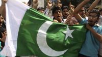 Pakistan's national flag displayed by Muslim youth in Kashmir