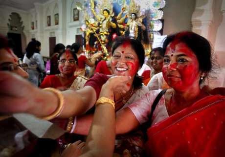 Guwahati ladies smearing each other with kumkum on Vijayadashami. Durga's Devotees