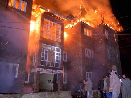 Burning school in Kashmir