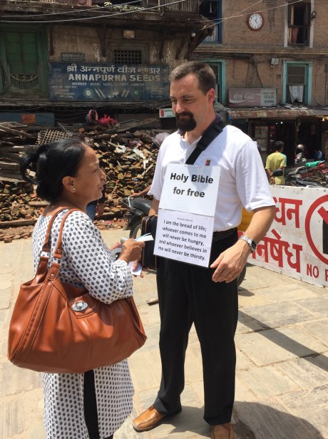 A Swiss missionary talks to a Nepali woman about the Bible in Kathmandu