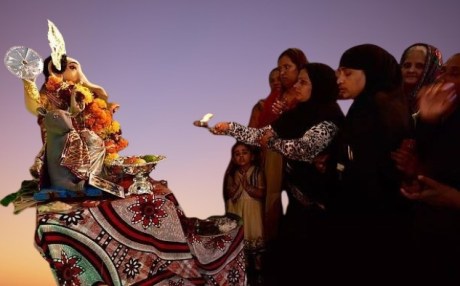 Muslim ladies worshipping Ganesha.