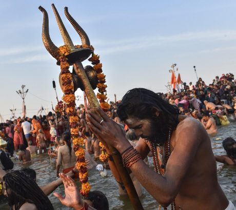 Sadhu bathing at Prayag Kumbh Mela Sadhu at Kumbh Mela