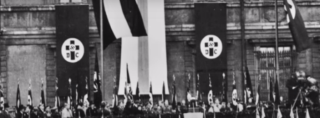 Christian cross and Nazi hooked cross joined together on banners in 1930s Germany. Christian cross and Nazi cross joined together (Germany ca. 1930)