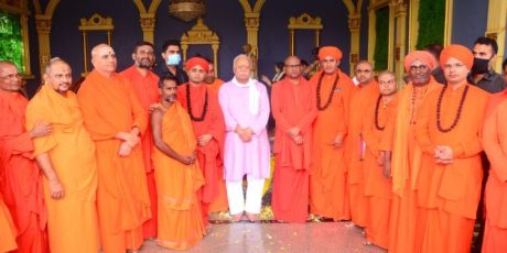 Mohan Bhagwat and Shivasharan Madara Chennaiah Ashram sadhus.