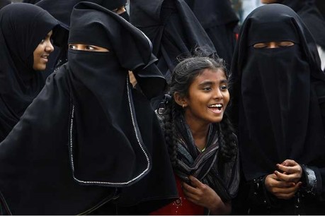 Hindu school girl with Muslim college students.