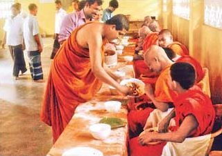 Buddhist monks feasting in Sri Lanka.