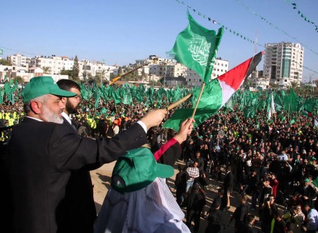 Ismail Haniyeh, senior Hamas leader and former prime minister of the Palestinian Authority, waving to supporters at a rally the Gaza Strip, Dec. 15, 2007. Today he is hiding out in his multi-million dollar mansion in Qatar.