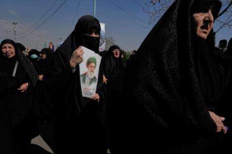 Iranian women mourn the death of Ayatollah Ali Khamenei.
