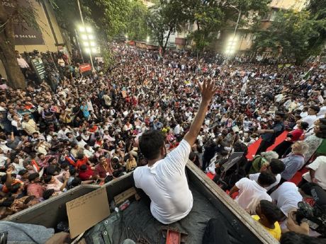 CJP Abijeet Dipke exhorts crowd to join banned Oct. 10 demonstration in Delhi.