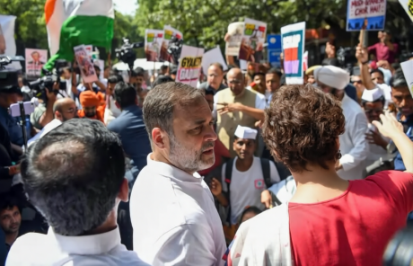 Rahul Gandhi and Priyanka Vadra Gandhi demonstrate against CEC Ganesh Kumar.